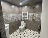 حمام و توالت فرنگی با کفپوش سنگ و سقف کاذب ویلا در سبزوار 95952