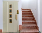 آسانسور و پله های سنگی طبقه پیلوت آپارتمان در مشهد 48471521
