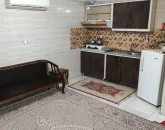 اتاق پذیرایی و آشپزخانه یخچال، هود، کابینت های چوبی خانه ویلایی در تایباد 58486541