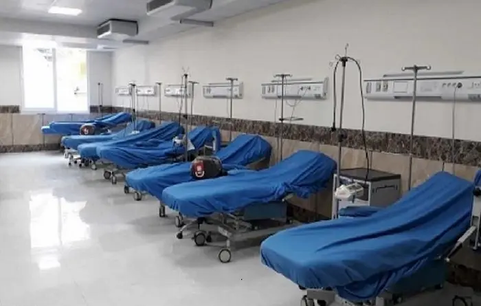 تخت های خالی آبی رنگ در بیمارستان شفا مشهد 415641